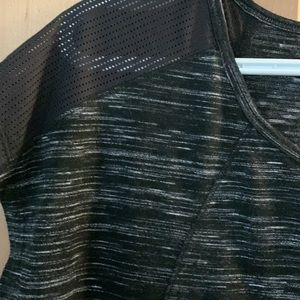 RBX black performance T-shirt mesh detail on shoulder and bottom back hem